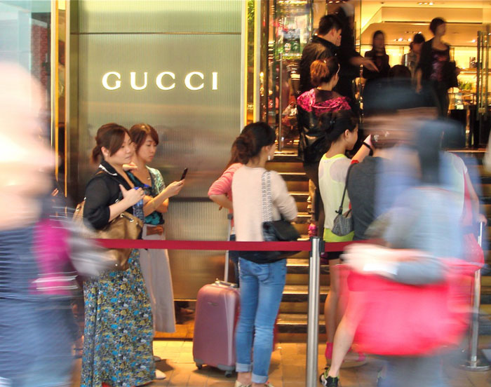 Chinese luxury shoppers outside Gucci
